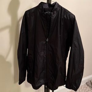 Mens light weight jacket. Like new! Zip front with zip pockets, vented back.